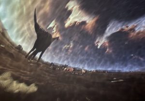 W świecie dinozaurów - fragment seansu filmowego w mobilnym kinie.