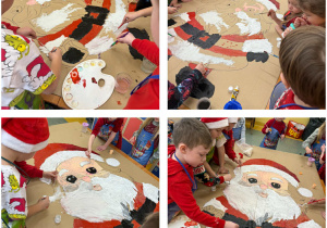 Dzieci z grupy Żabki malują farbami postać Świętego Mikołaja