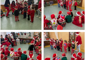 Grupa Słoneczka podczas odbierania prezentu od Świętego Mikołaja.