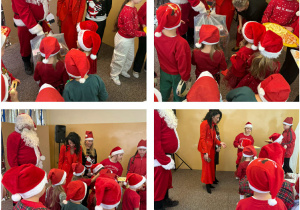 Grupa Żabki odbiera prezent od Mikołaja.