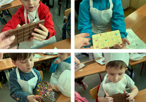 Dzieci wyjmują z foremek schłodzone czekolady.