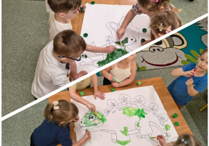 Dzieci z grupy Słoneczka układają mega puzzle dinozaura.